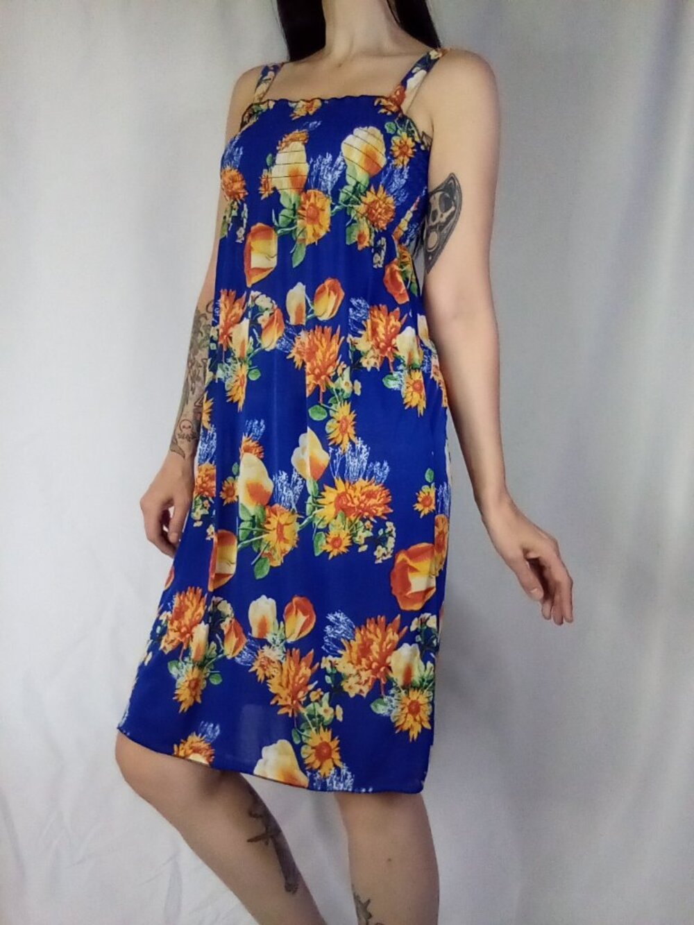 Blue Floral Smocked Dress with Orange & Yellow Flowers.